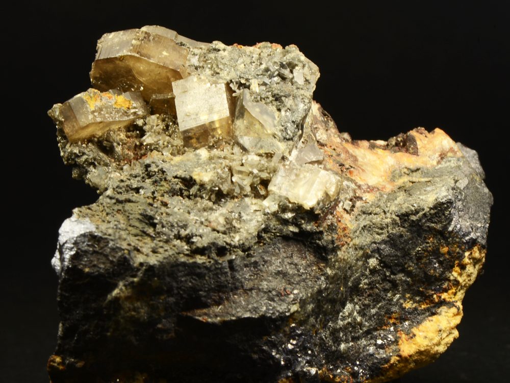 Phosgenite — honey-coloured tabular crystals of lead carbonate-chloride